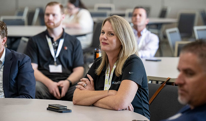 NECA Future Leaders Event | Woman Sitting at Table