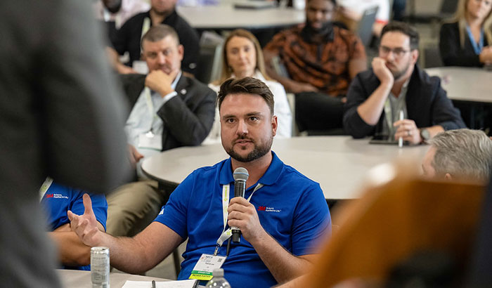 NECA Future Leaders Event | Man Asking Question with Microphone in Hand