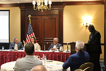 Panelists Edwin Lopez, Kristen Gowin, Jeff Scarpello and Moderator Ron Bailey
