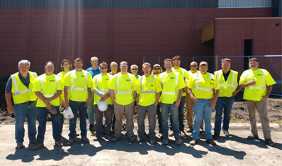 Photo of Rick Electric, Inc. team. Their onsite construction workers had received a luncheon from the leadership of Rick Electric, Inc. to give back to their efforts in building the North Dakota State University (NDSU) Football Performance Complex.