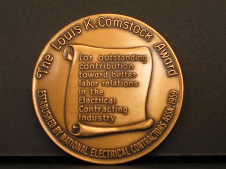 Image of the NECA Comstock Award
